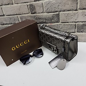 Женская серебряная сумка GUCCI из кожи