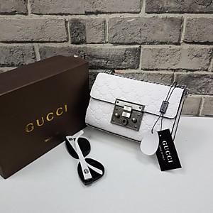 Женская белая сумка GUCCI из кожи