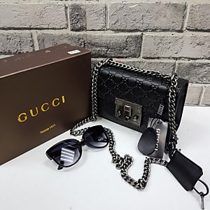 Женская чёрная сумка GUCCI из кожи